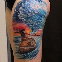 Colorful bottle with a ship in ocean tattoo on thigh