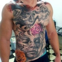 Colorful breathtaking looking chest and belly tattoo of various people portraits with star and flowers