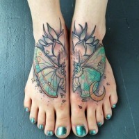 Colorful butterfly tattoo on feet by Mike Moses