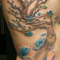 Colorful family tree tattoo on ribs