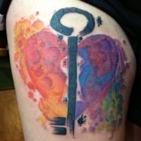 Colorful heart and black key tattoo on thigh wor women