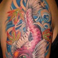 Colorful koi fish tattoo on shoulder