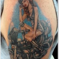 Colorful motorcycle pin up girl tattoo on shoulder
