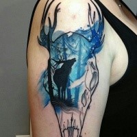 Colorful new school style shoulder tattoo of animal skull stylized with deer