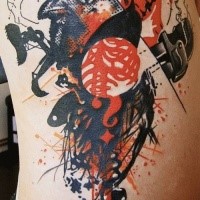 Colorful photoshop style tattoo of bird with various instruments