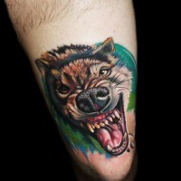 Colorful portrait of furious wolf tattoo