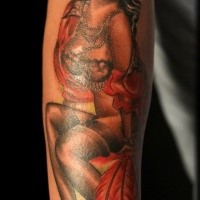 Colorful realistic looking forearm tattoo of seductive woman