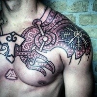 Colorful stippling style chest and shoulder tattoo of ancient armor