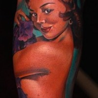Colorful vintage pinup girl tattoo