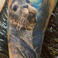 Colorful watercolor otter animal tattoo by dmitry visioon
