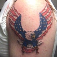 Colors of american flag eagle tattoo on shoulder