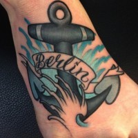 Coloured anchor with signature berlin tattoo on foot