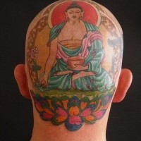 Coloured buddha tattoo on head