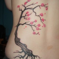 Tatuaggio sulla schiena l'albero con i fiori rosa