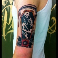 Coloured death in a coffin tattoo on half sleeve