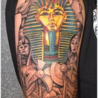 Coloured egyptian pharaoh tattoo on arm