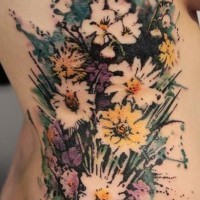 Coloured lovely flowers tattoo on ribs
