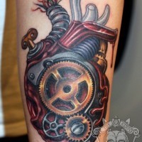 Coloured mechanical heart tattoo by Tim Kern