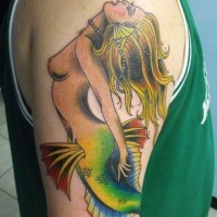 Coloured old school mermaid tattoo on half sleeve