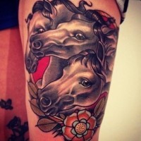 Coloured old school portrait of three dark horses tattoo