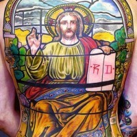 Coloured portrait preaching of jesus tattoo on whole back