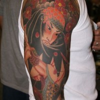 Tatuaggio colorato sul braccio il samurai