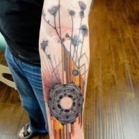 fiori colorati e forme geometriche tatuaggio