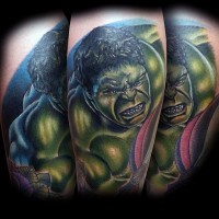 Comic books style colored forearm tattoo of Hulk and pink ribbon