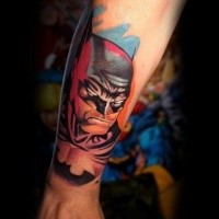 Comic books style colored forearm tattoo of Batman face