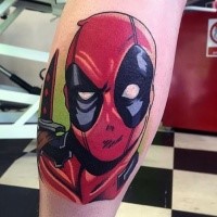 Comic books style colored leg tattoo of Deadpool