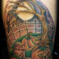 Comic books style colored pumpkin on cemetery arm tattoo