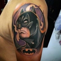 Comic books style colored shoulder tattoo of Batman face