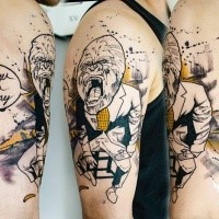 Comic books style colored shoulder tattoo of human-monkey with lettering