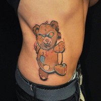 Cool bear shaped colorful voodoo doll tattoo on side