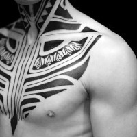 Cool black and white tribal style tattoo on chest and neck