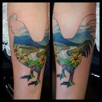 Cool cock shaped forearm tattoo stylized with beautiful countryside