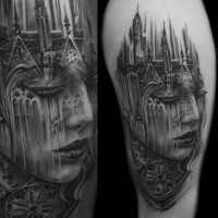 Cool combined big black and white woman stylized with old medieval city tattoo on shoulder
