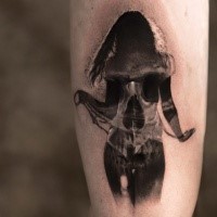 Cool designed black ink tattoo of human silhouette and skull