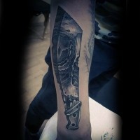 Cool detailed big black ink knife tattoo on arm