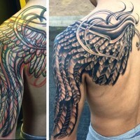 Cool futuristic black and white feather wing tattoo on shoulder