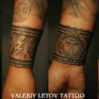 Cool idea of bracelet sailor wrist tattoo by Valeriy Letov