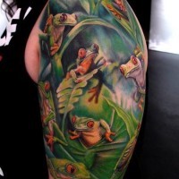Cool idea of frog tattoo on half sleeve
