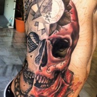 Cool idea of half skull half face tattoo on ribs