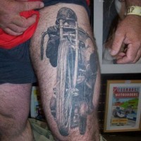 Cool idea of motorcycle tattoo on thigh