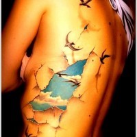 Cool idea of skin rip tattoo on ribs