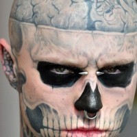 Cool idea of skull face tattoo