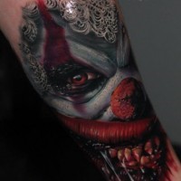 Cool idea of spooky clown tattoo on arm by Szalai Tibor
