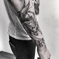 Cool looking black ink forearm tattoo of fantasy demonic fox by Inez Janiak