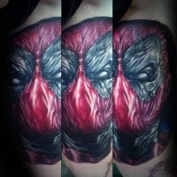 Cool looking colored very detailed tattoo of Deadpool hero face
