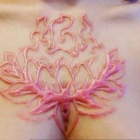 Cool lotus skin scarification on chest for girls
